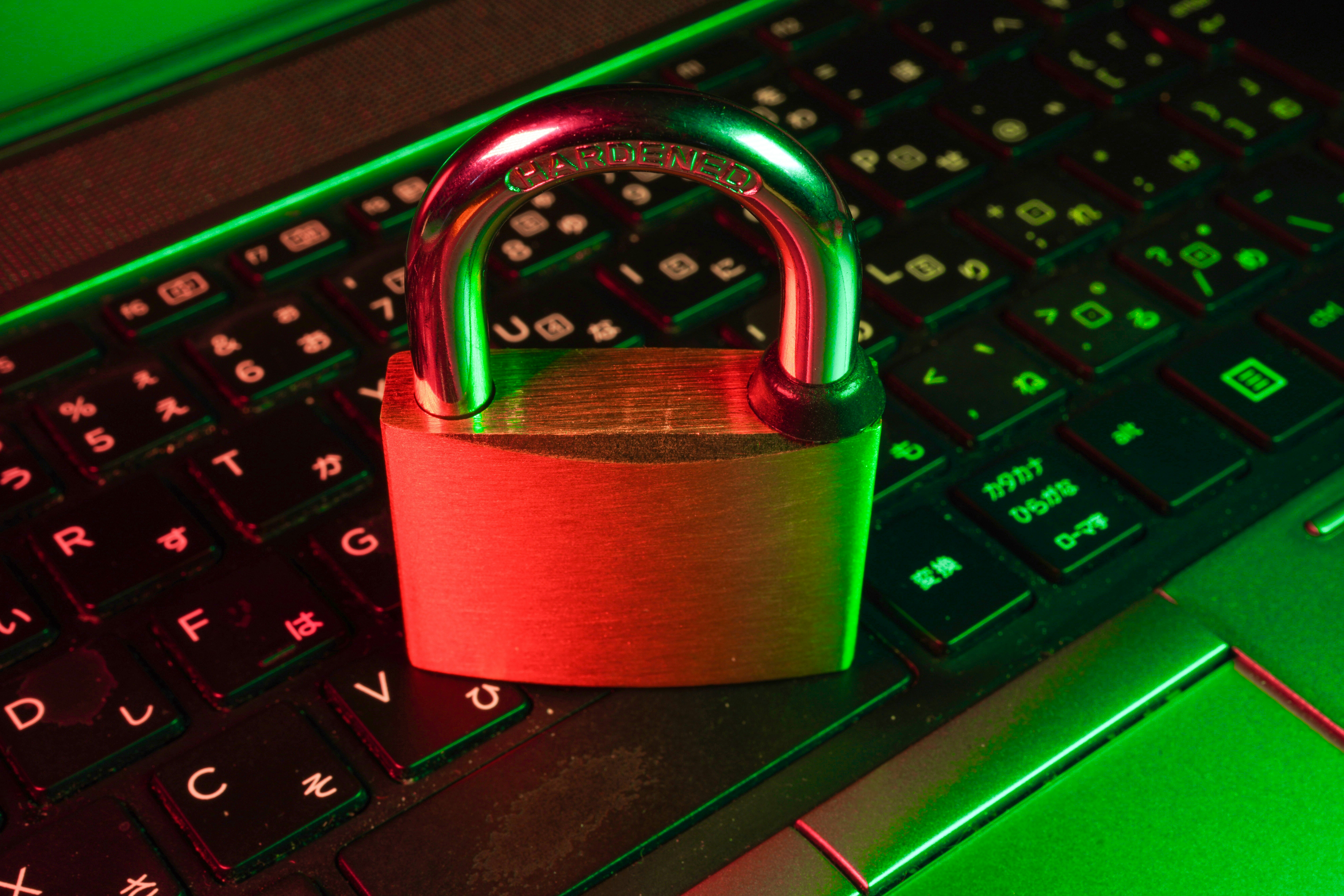 Cybersecurity experts reviewing data on screens